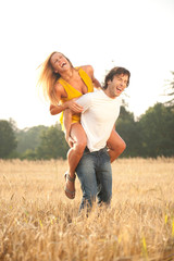 Happy young couple in love enjoying a summer day