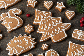 Obraz na płótnie Canvas Christmas gingerbread cookies on a dark background