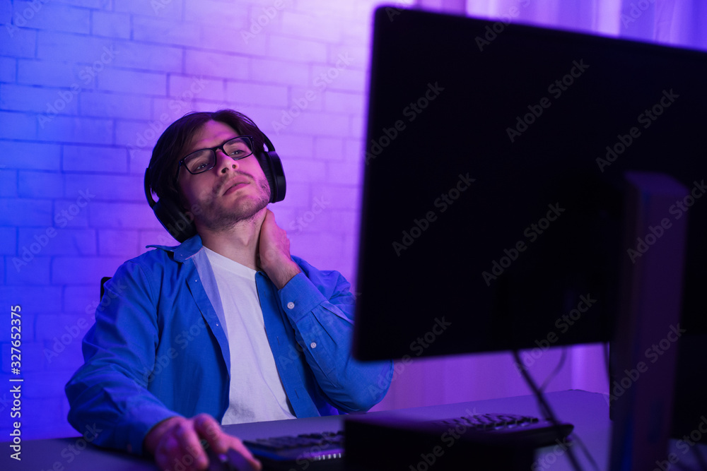 Aufkleber Tired Programmer Working On Computer Touching Aching Neck At Home