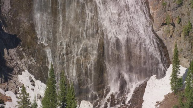 Ouzel Falls cascade down a dramatic rock formation on Ouzel Creek, in Yellowstone National Park