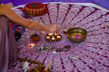 hands with easter eggs and flowers