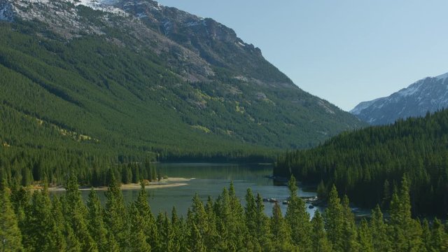Island Lake settled in a steep valley in the Beartooth mountain Range