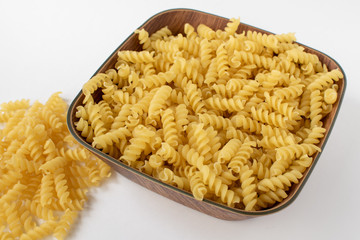 Italian spiral macaroni macaroni raw food , background.