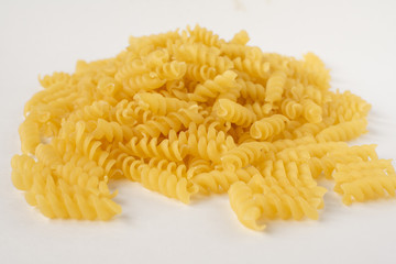Italian spiral macaroni macaroni raw food , background.