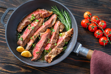 Beef steak in the frying pan
