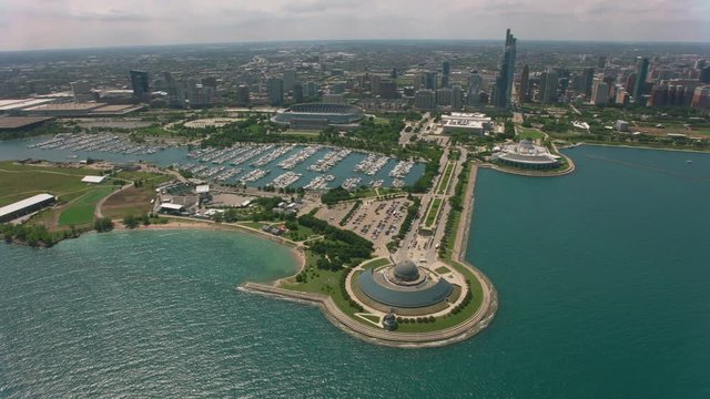 Chicago, Illinois circa-2019.  Aerial view of Alder Planetarium on Lake Michigan in Chicago.  Shot from helicopter with Cineflex gimbal and RED 8K camera.