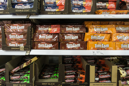 Gold Coast, Australia - May 09 2018: Tim Tam chocolate biscuits with various flavor are displayed in a supermarket.