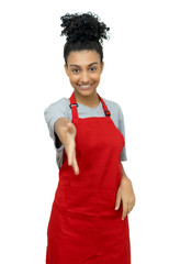 Latin american waitress with red apron reaching hand