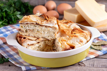 Homemade lavash pie with cheese and herbs
