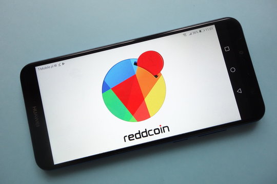 KONSKIE, POLAND - November 18, 2018: ReddCoin (RDD) cryptocurrency logo displayed on smartphone
