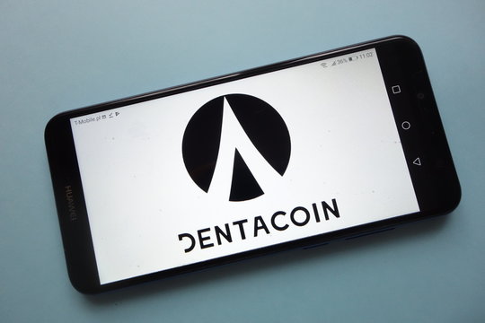 KONSKIE, POLAND - November 18, 2018: Dentacoin (DCN) cryptocurrency logo displayed on smartphone