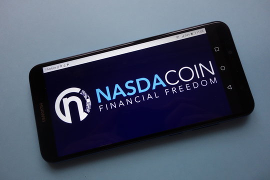 KONSKIE, POLAND - November 18, 2018: Nasdacoin (NSD) cryptocurrency logo displayed on smartphone