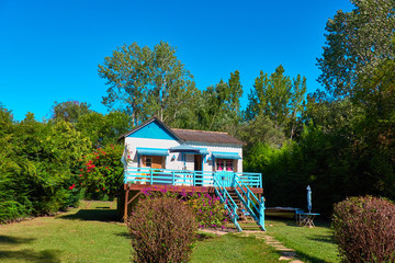 Traditional wooden house, ranch in Tigra delta in Argentina: canals and river streams of the Parana...