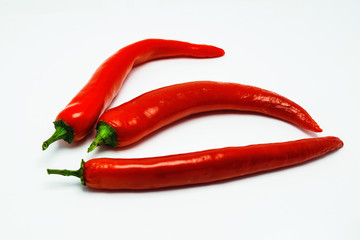 Hot red chili peppers close-up isolate on a white background.
