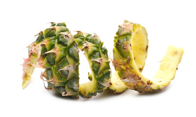 Pineapple peel and foliage isolated on white background