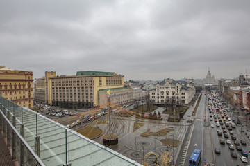 Fototapeta na wymiar City landscape in cloudy weather from the observation deck of the Children's World Mall. Moscow, Russia