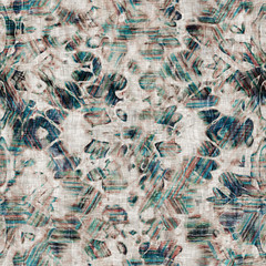 Seamless mixed media collage design in old aged worn look. Variable kaleidoscope design overlaid, mottled, and distressed on fabric texture. Seamless repeat raster jpg pattern swatch.