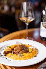 Duck Leg Confit with Pumpkin Puree and Red Wine Sauce