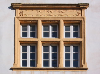 Renaissance window frame at the Amtshaus building facade in the old town of Trier Pfalzel in Germany