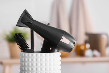 Modern blow dryer and hairdresser tools in salon