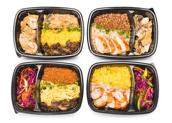 Containers with healthy food on white background