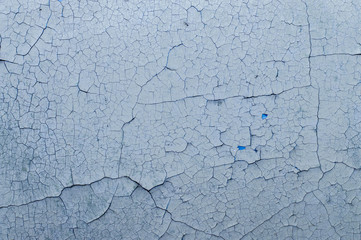 Old painted wall with cracked paint