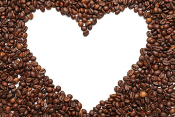 Heart made of coffee beans on white background