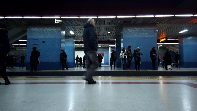 Ankara, Turkey - February 26, 2020: Time-lapse of people waiting and boarding trains at subway station platform in Ankara, Turkey. Turkey city life, or public transportation concept 
