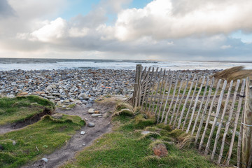 Dunes by ocean, Strandhill beach county Sligo, Cloudy sky, nobody.