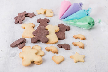 Pattern of traditional handmade smiling biscuits gingerbread men cookies
