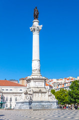 Fototapeta na wymiar Marble statue of Pedro IV on Rossio square, Lisbon, Portugal
