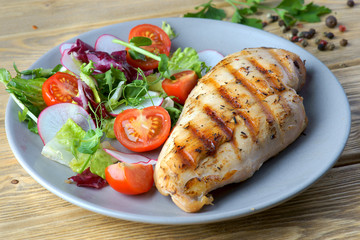 grilled chicken fillet with vegetable salad
