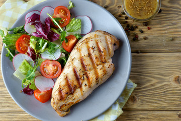 grilled chicken fillet with vegetable salad