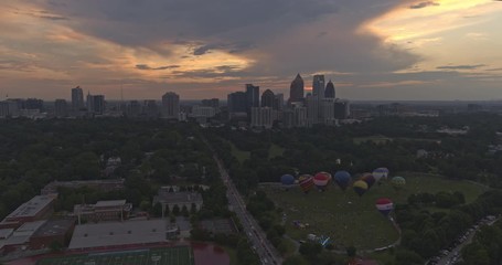 Atlanta Aerial v539 Panning view of hot air balloons and midtown with sunset, dusk sky - August 2019 - Powered by Adobe