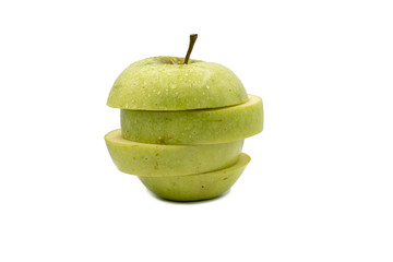 fresh green apple cut into slices with little drops of water, isolated on white background, vegetarian food