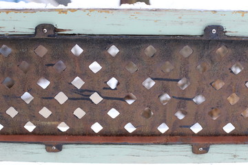 Rusty metal pattern with green wood on the sides. metal pattern.