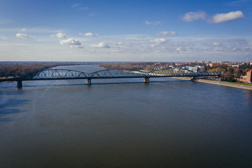 Drone view on the River Vistula and Jozef Pilsudski bridge in Torun city in Poland
