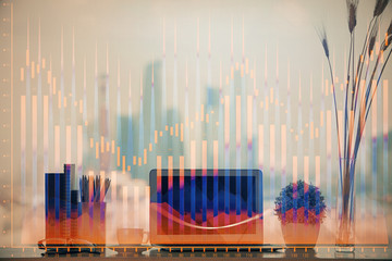 Financial market graph hologram and personal computer on background. Multi exposure. Concept of...