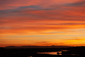 Catalina Island golden sunset viewed from Newport Beach back bay in California