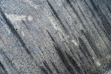 Cement floor, old concrete with black stain in general