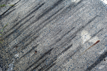 Cement floor, old concrete with black stain in general