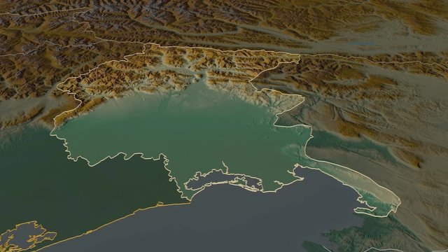 Friuli-Venezia Giulia, autonomous region with its capital, zoomed and extruded on the relief map of Italy in the conformal Stereographic projection. Animation 3D