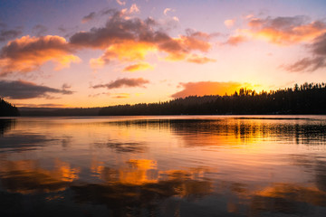 Fototapeta na wymiar colorful sunrise on a calm lake