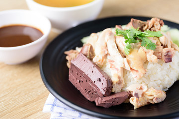 Thai cuisine (Khao Man Kai), Hainanese chicken rice eating with chili sauce and chicken soup