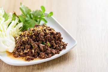 Traditional Northern Thai food, spicy minced pork salad (Larb Moo Kua)