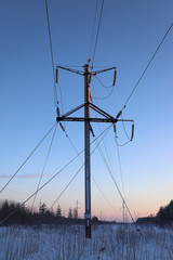 Fototapeta premium Transmitting tower of high-voltage line or power tower or electricity pylon in the field