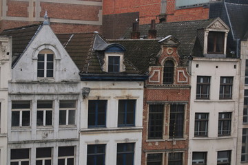Top floors of old historical houses that are typical for old cities in the netherlands and belgium