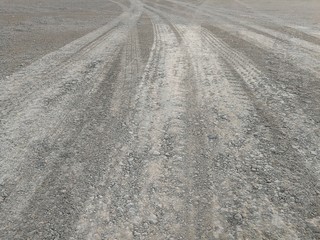 Naklejka premium The road that has traces of wheels passing by