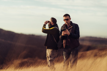 Two friends hiking in the hills