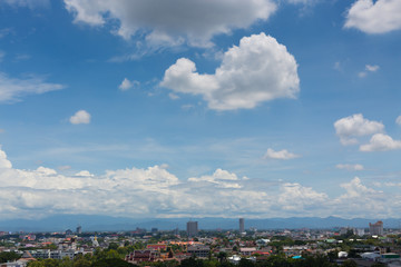 Obraz premium white cloud on blue sky above the town, aerial view cityscape